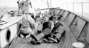 Atlantis Crew Relaxing on Deck